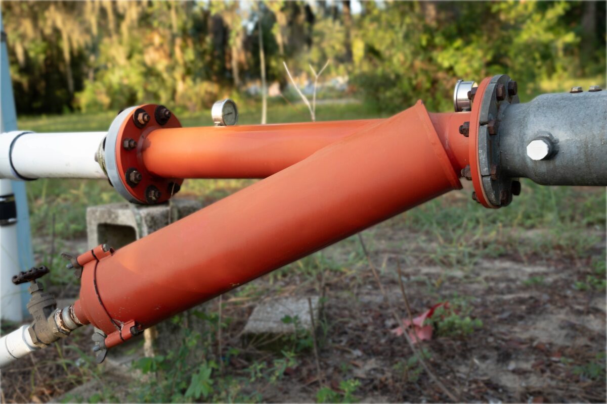 Agricultural irrigation filtration system with red sand media filter — Pierson Supply irrigation filtration equipment